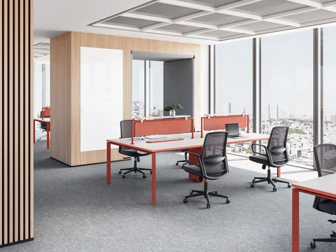 Task chairs at workstations in a commercial office