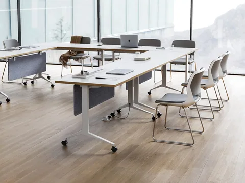 Flip top tables set out in a training room